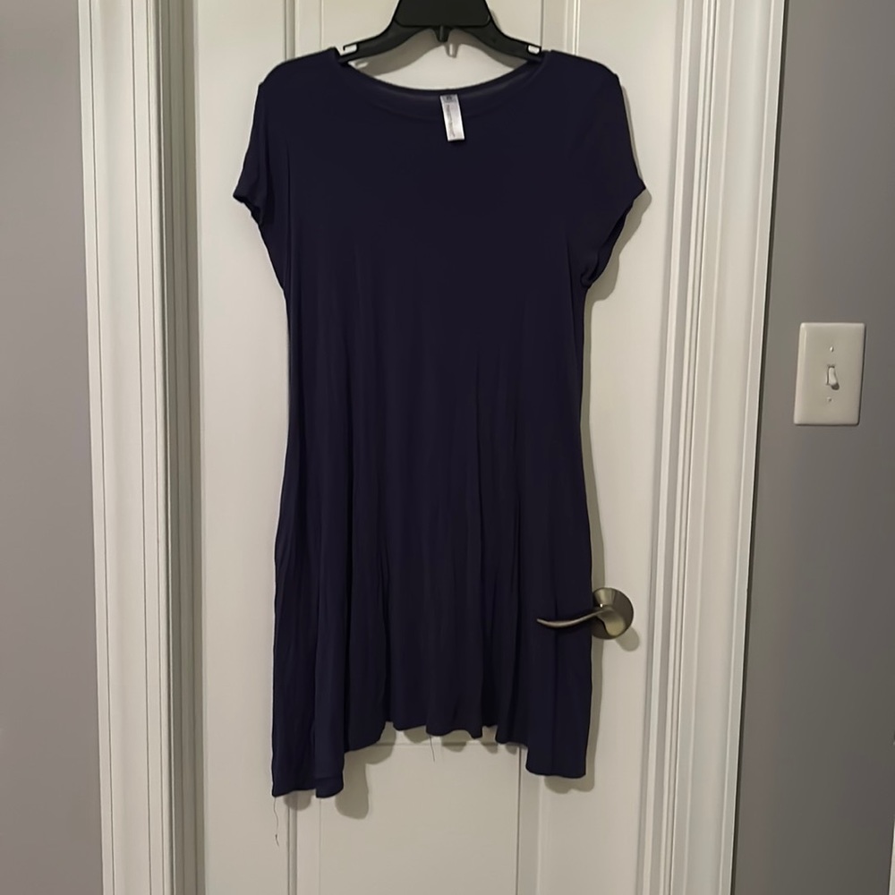 Navy blue dress with pockets.